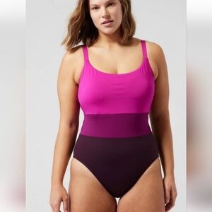Athleta 1 PC swimsuit size large. Multiple colors of purple shades. NWT.